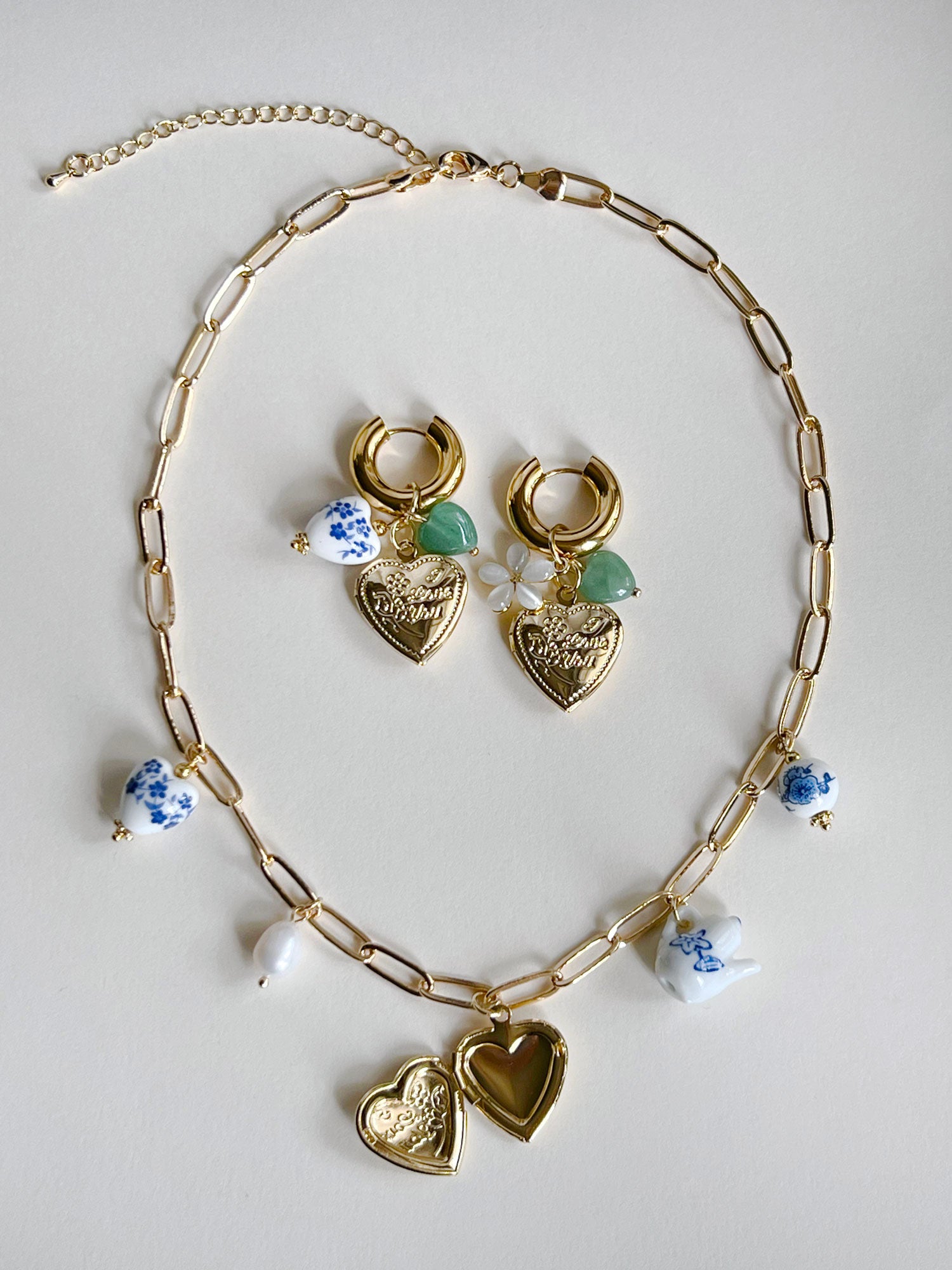 Collier de charme éclectique - Médaillon coeur géant en or