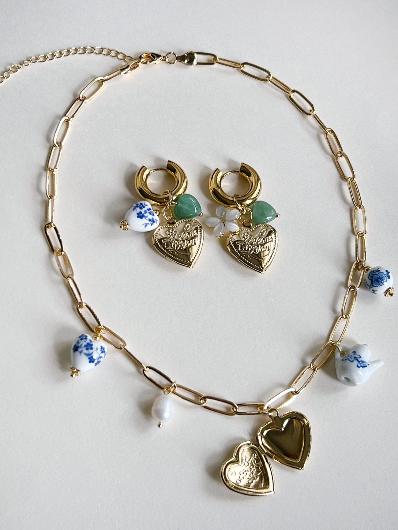 Collier de charme éclectique - Médaillon coeur géant en or