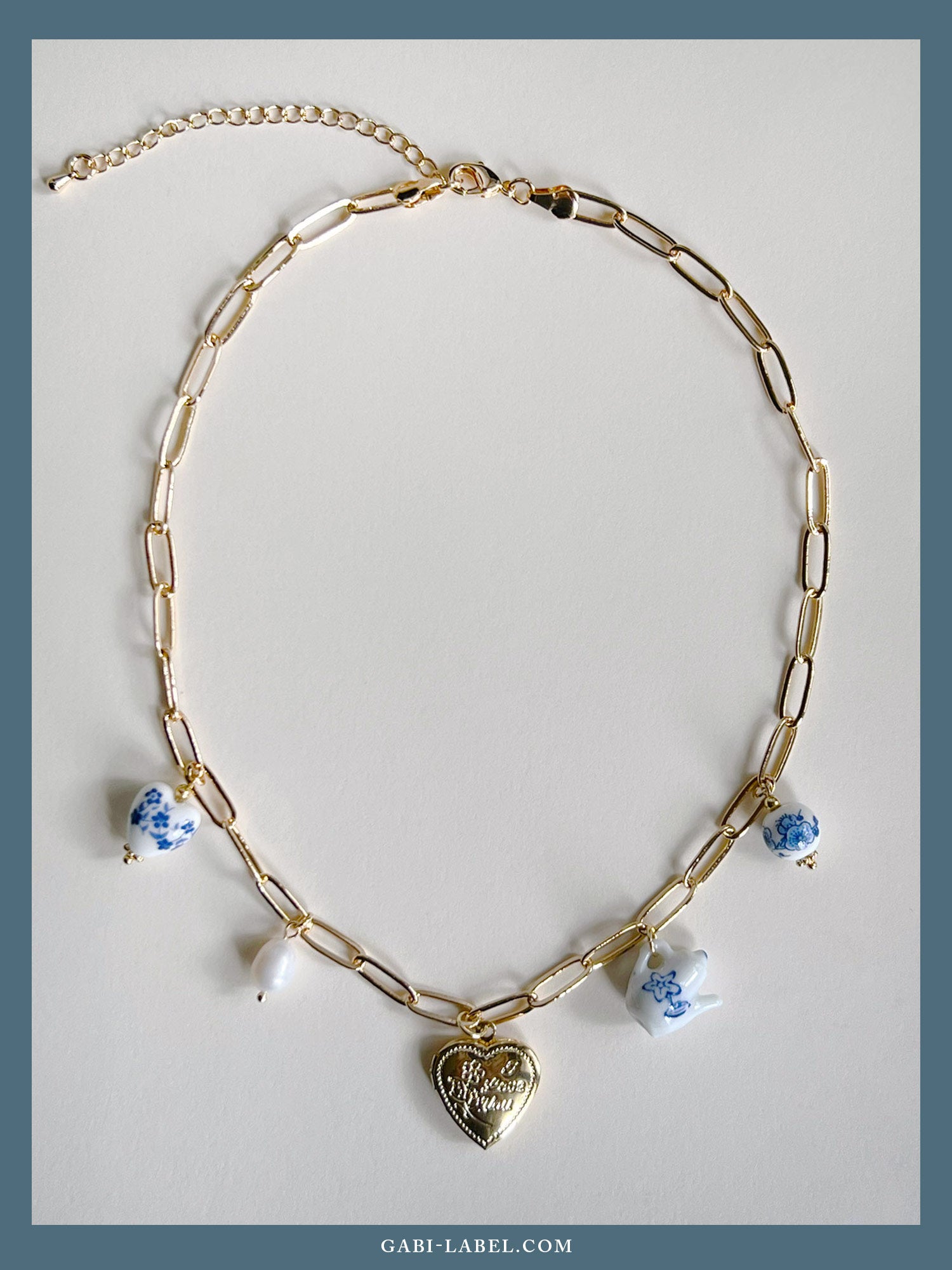 Collier de charme éclectique - Médaillon coeur géant en or