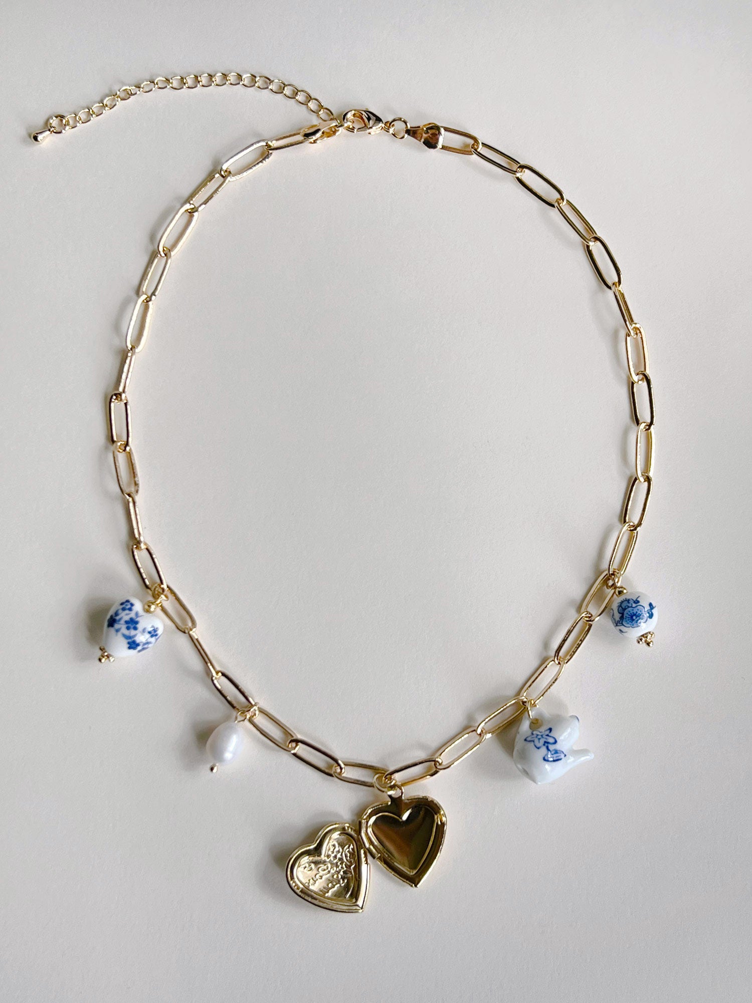 Collier de charme éclectique - Médaillon coeur géant en or