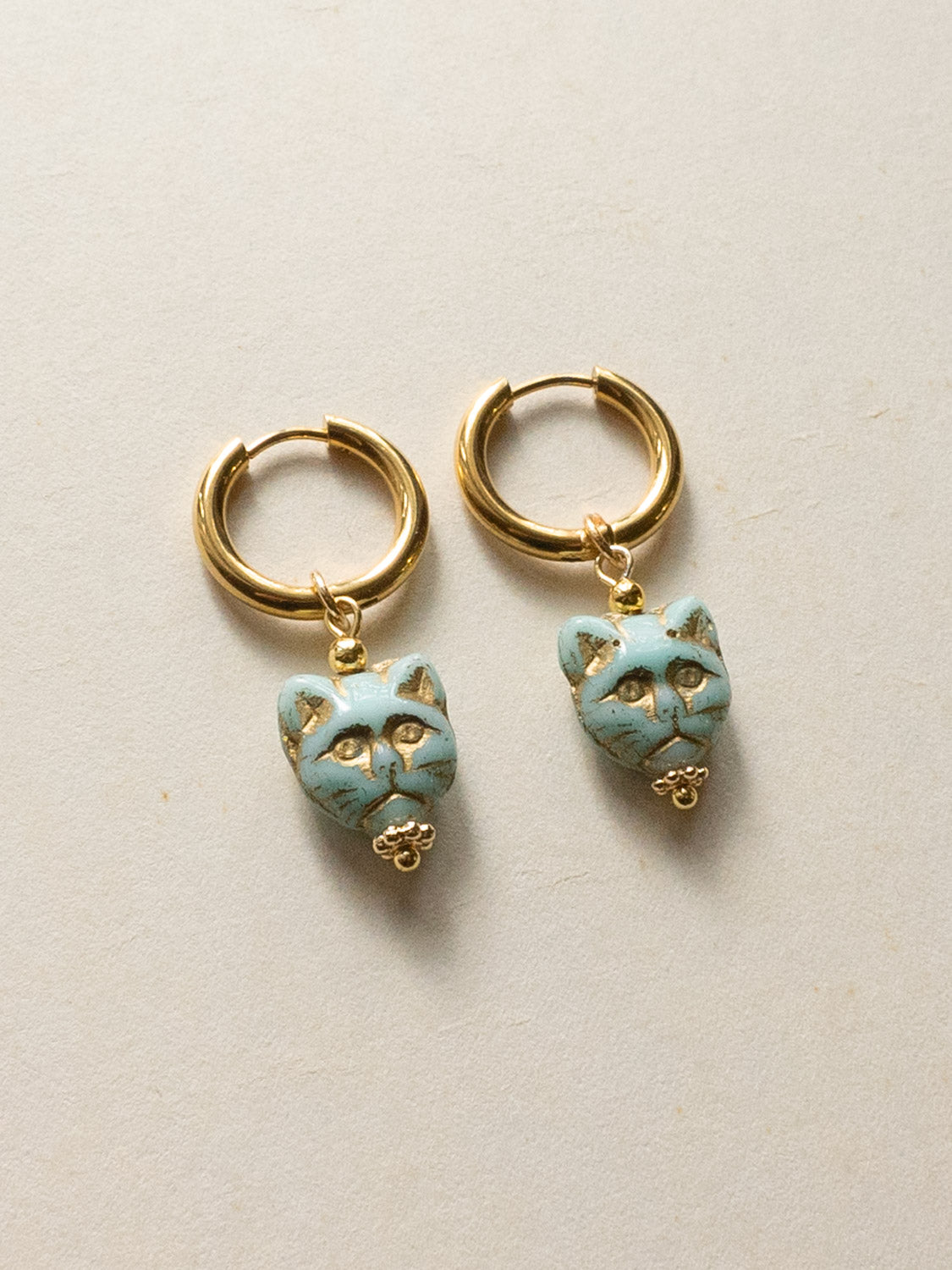 Glass Carved Cat Hoops   Light Blue model 29f1ff25 8160 49e2 9edb bb0bd38084fc