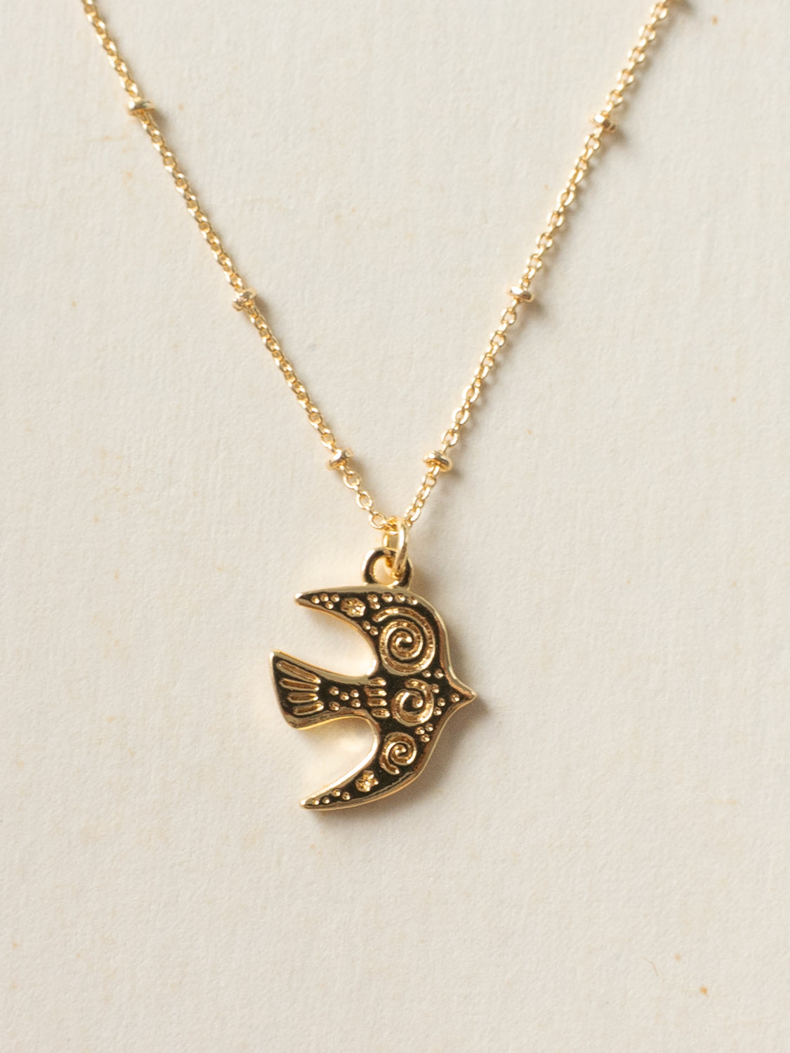 Resort Necklace  Gold   Carved Peaceful Dove1