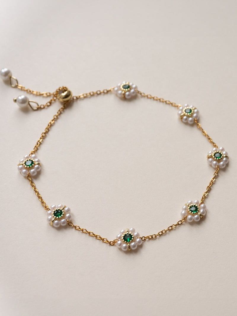 Petite Pearl Flower Bracelet With Emerald Gemstones