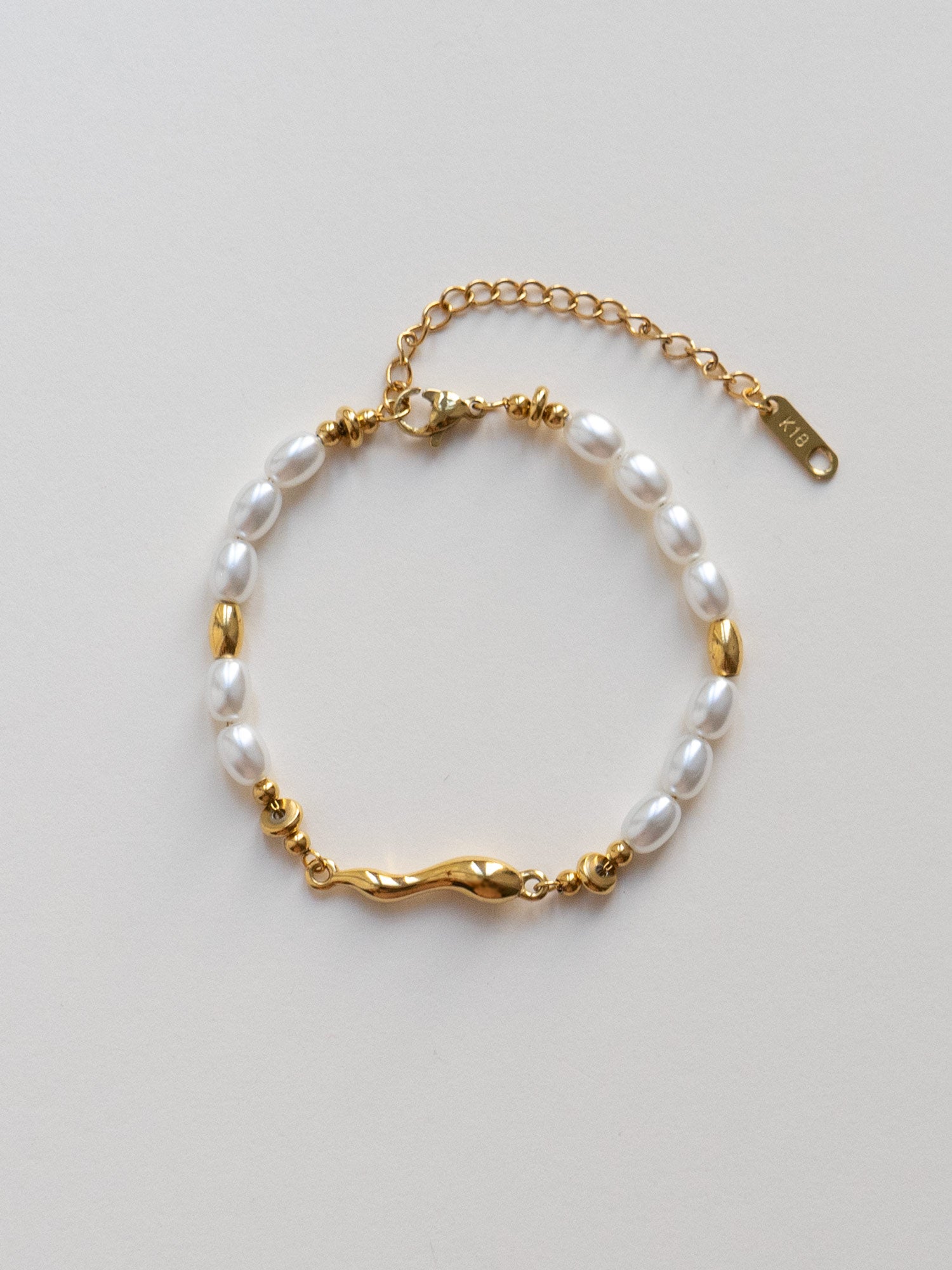 Bracelet Perle Et Or Fluide