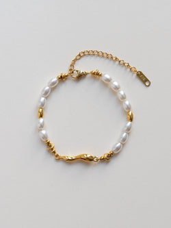 Pearl And Fluid Gold Bracelet