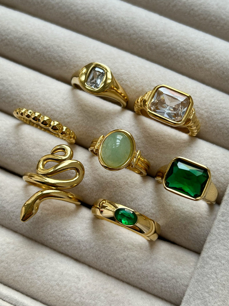 Gold Ring with Oval-encrusted Gemstone - Emerald Green
