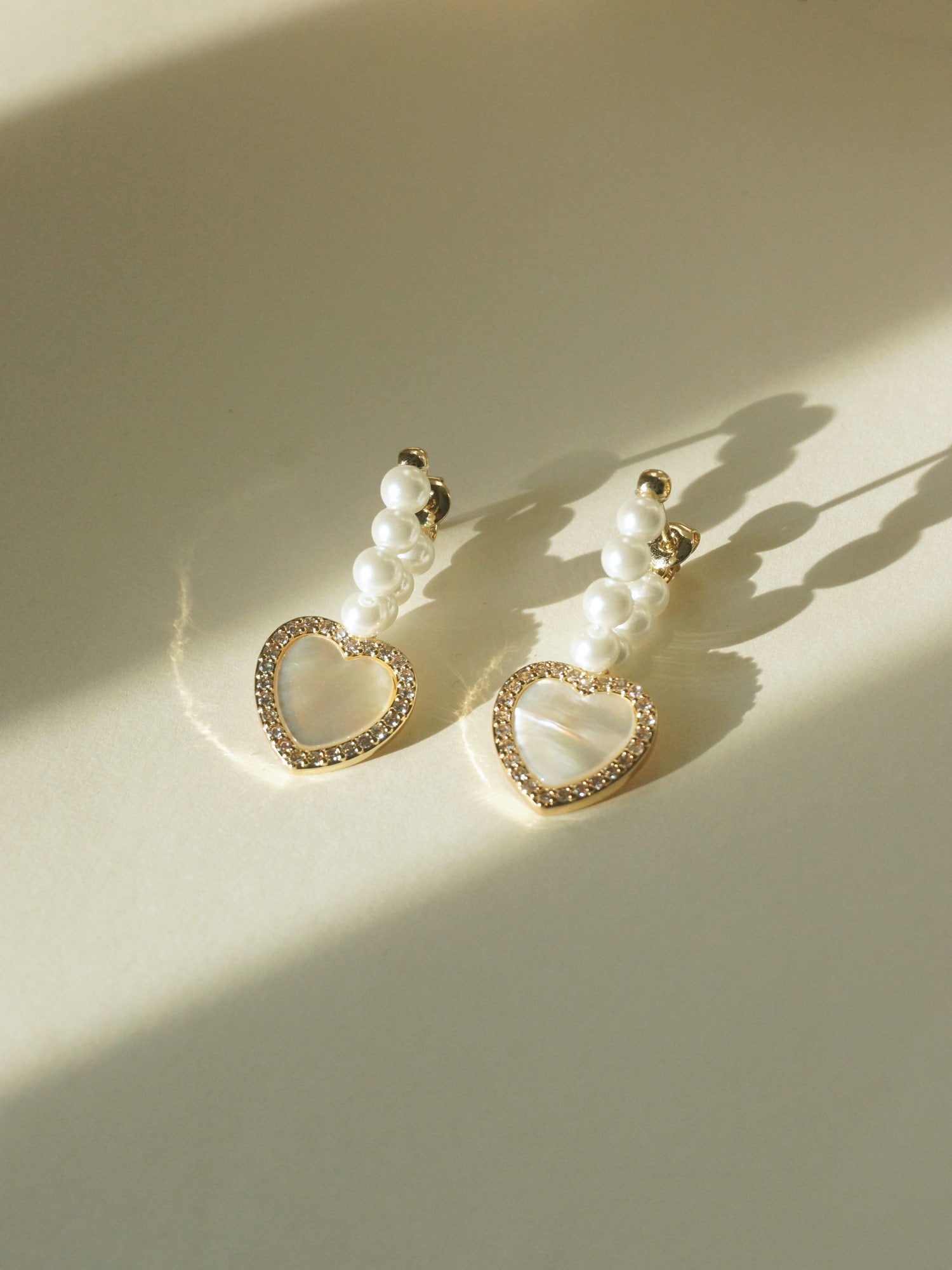 Boucles d'oreilles coeur coquillage avec perles