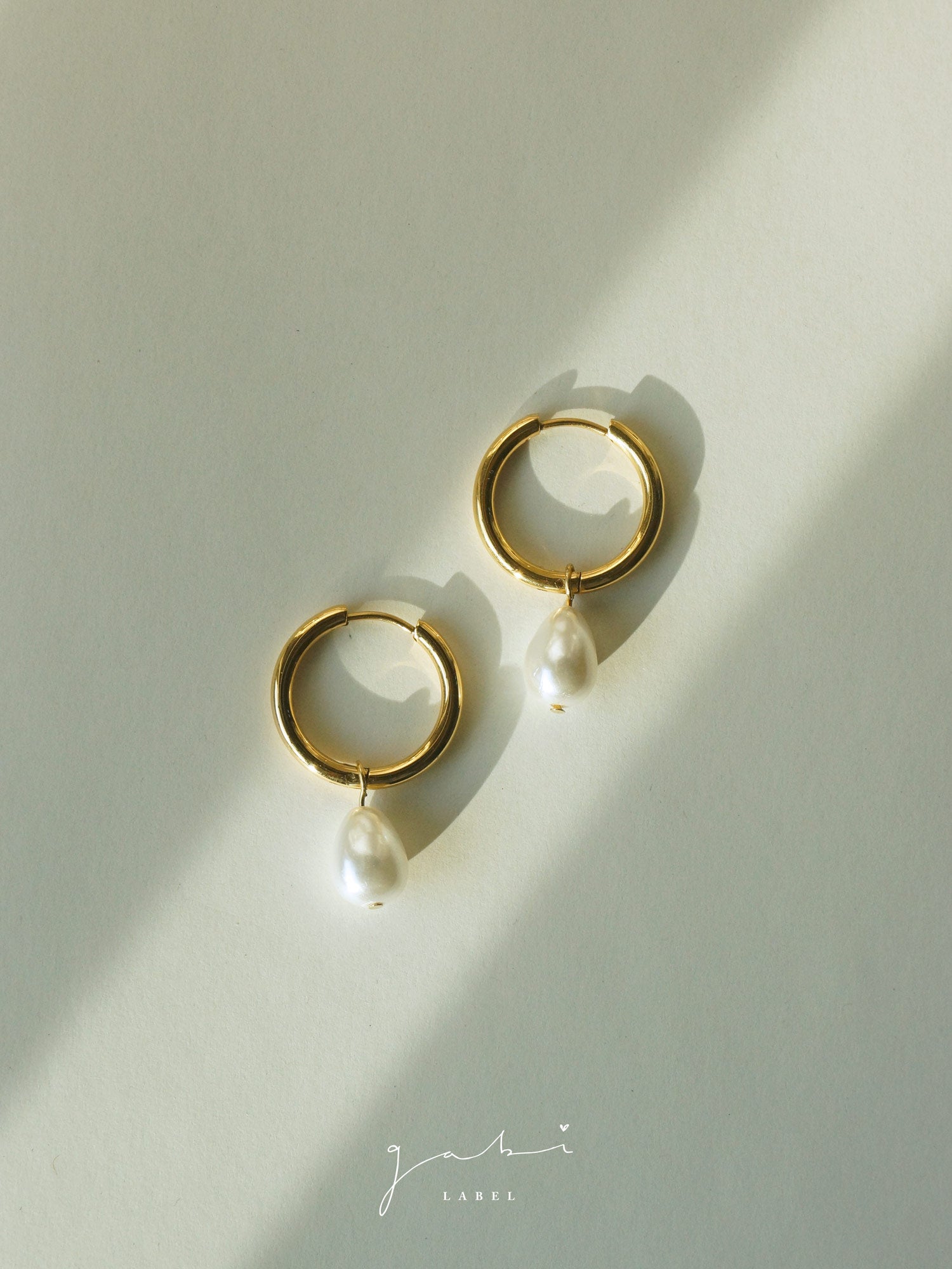 Créoles en acier inoxydable avec perles en forme de larme